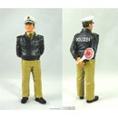 Polizist, grueÂne Uniform